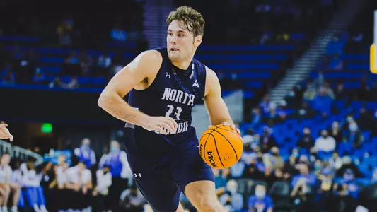 Josh Berenbaum driving to the hoop