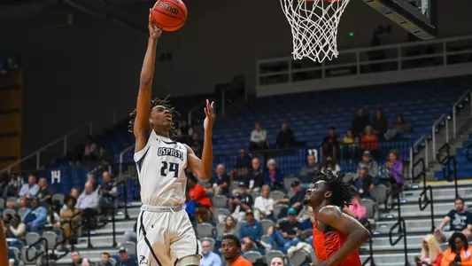 Jadyn Parker takes a hook shot over a defender