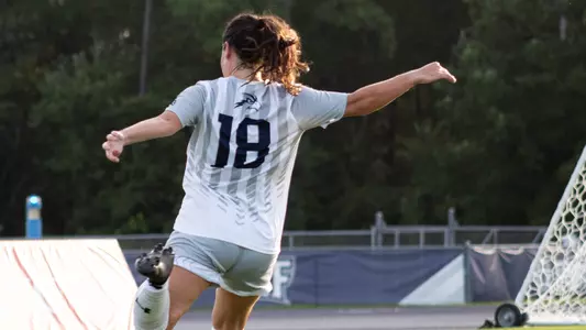Mikayla Bond kicking the ball