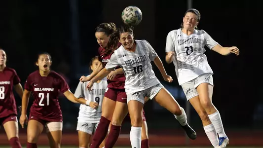 Mikayla Bond heading the ball