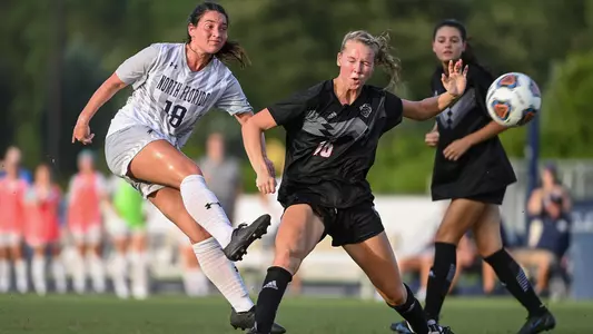 Mikayla Bond kicking the ball