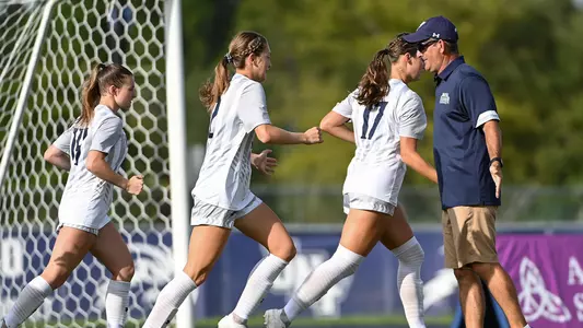 Eric Faulconer high fiving
