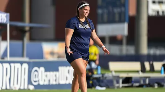 Rachel Fiskin walking on the field