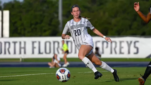 Amanda Hartmann chasing the ball