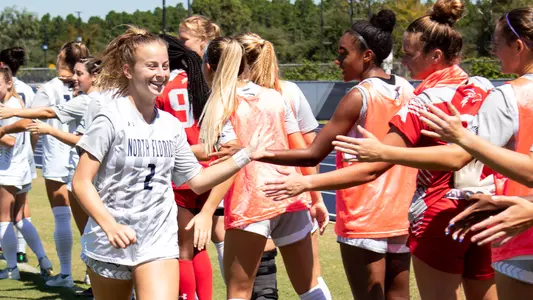 Haynes Grant high fiving the team