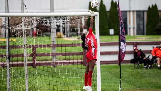 Mercedes Sapp jumping to save the ball