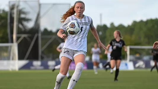 Emma Voigt chasing after the ball
