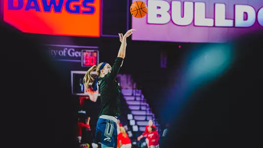 Erin Jones takes a shot during warmups