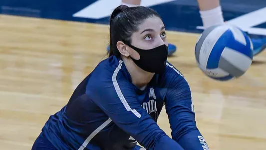 Rocio Moro digs out a ball