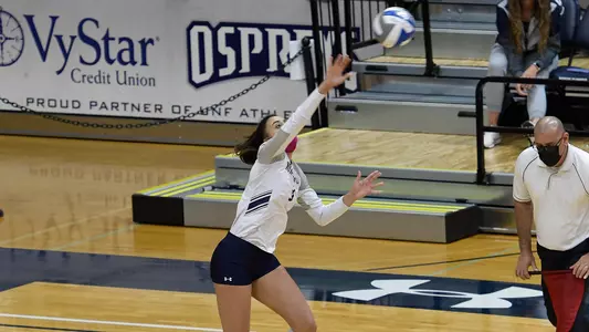 Gabby O'Connell swings on a serve