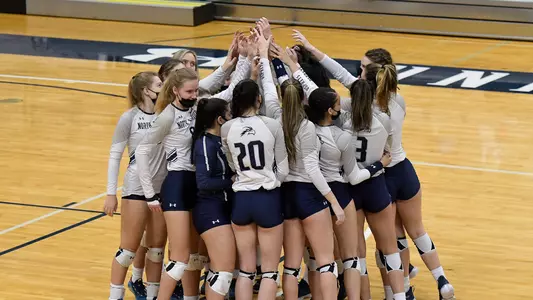 volleyball team huddle