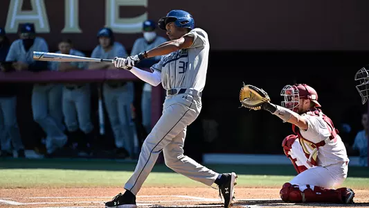 Justin Holmes swinging