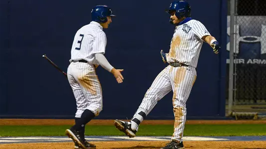 Players high-five after score