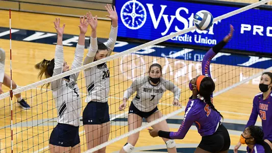 Julianna Askew blocks the ball.