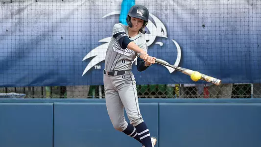 Taylor Engman hits the ball against Boston College