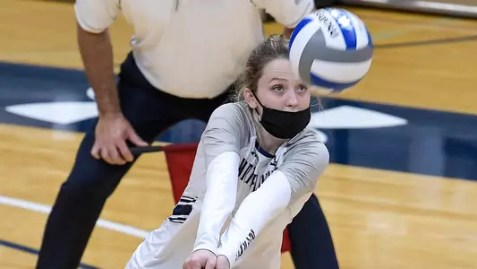 Logan O'Brien sets the ball.