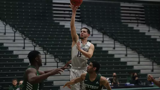 Jose Placer shoots the ball