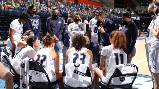 Team huddle against Florida