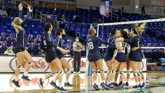 UNF Volleyball celebrates a point