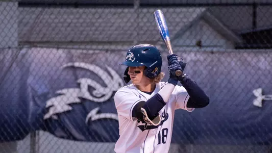 Tanner Clark stands at the dish