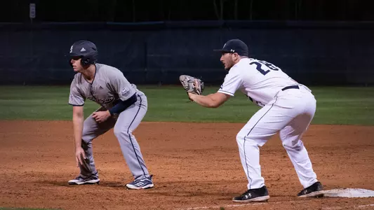 Kachler holds a runner on