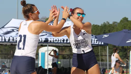Harrison and Roskic high five