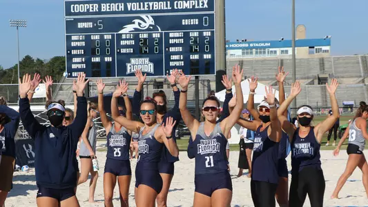 UNF beach volleyball team celebration