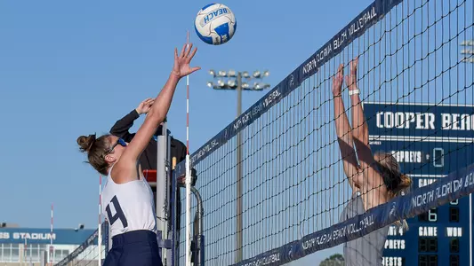 Carolyn Cain makes an attack on the ball.