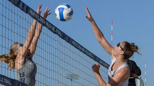 Carolyn Cain makes an attack on the ball.