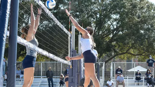 Lauren Galinis makes an attack on the ball.