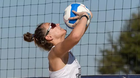 Antonia Harrison sets the ball.