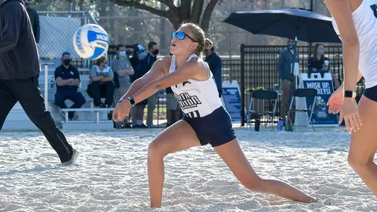 Anna Mallory digs out the ball.
