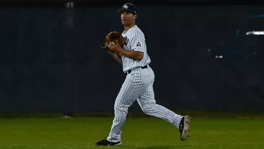 Austin Bogart catches a fly ball.