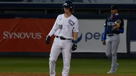 Tanner Clark gets a lead off of second.