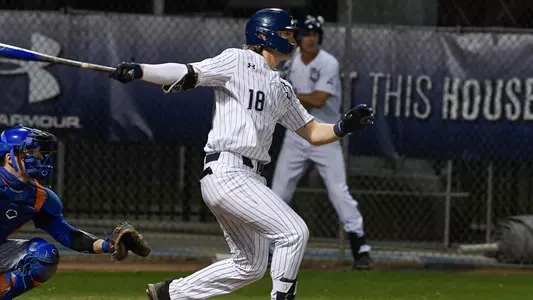 Tanner Clark swings at a pitch.