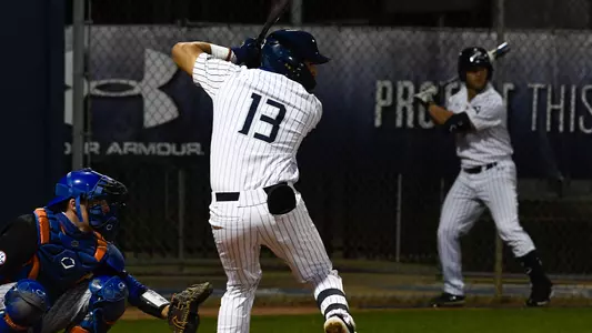 Abraham Sequera gears back for a pitch.