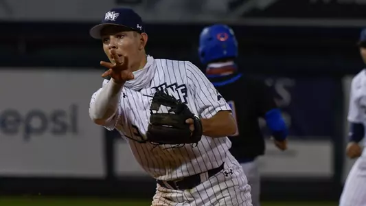 Aidan Sweatt throws a ball.