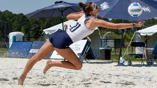Antonia Harrison dives after a ball.