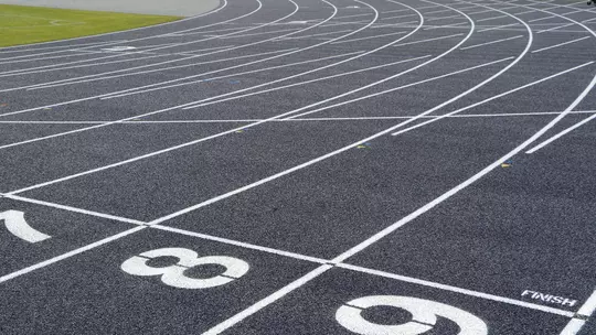 Field level view of the track lanes at Visit Jax Track