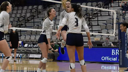 team celebration for unf volleyball