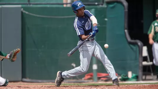 Justin Holmes hitting the ball
