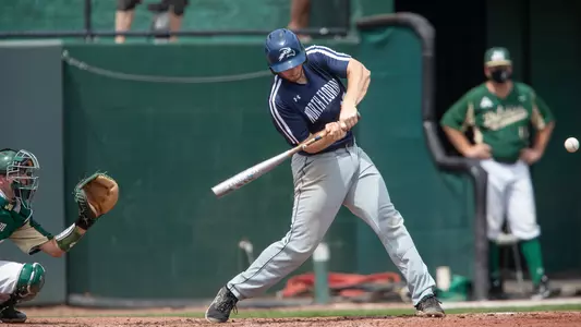 Alex Kachler swinging at bat