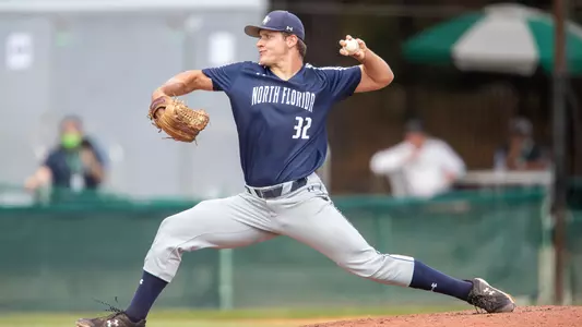 Tony Roca pitching the ball