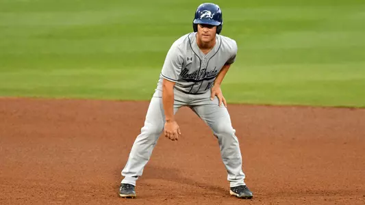 Austin Bogart leading off of a base.