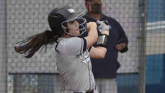Shannon Glover swings the bat against Boston College