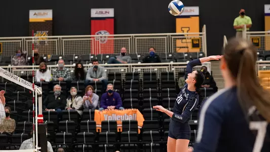 Maddie Boyd goes for an attack on the ball.