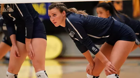Bre Walp looks on before a point.