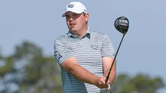 Michael Mattiace swings a golf club