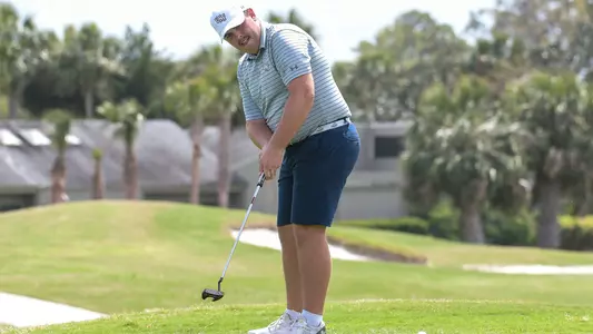 Mike Mattiace watches his putt roll on the green