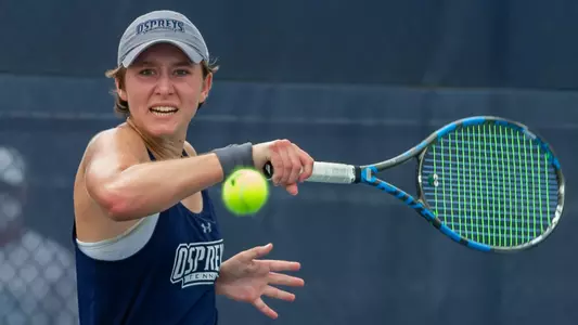 Catherina Gulihur hits a one-hand backhand.